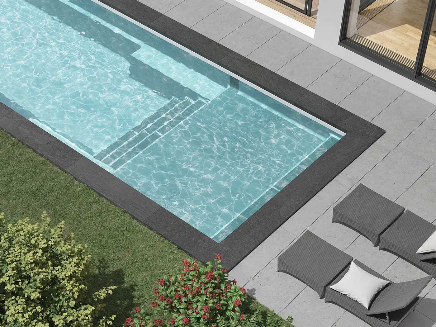 Mova fiberglass pool with broad entry steps and a sun ledge